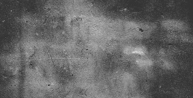 Muro de hormigón negro o fondo de textura de piedra granulada áspera gris oscuro