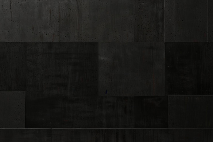 Foto muro de hormigón negro