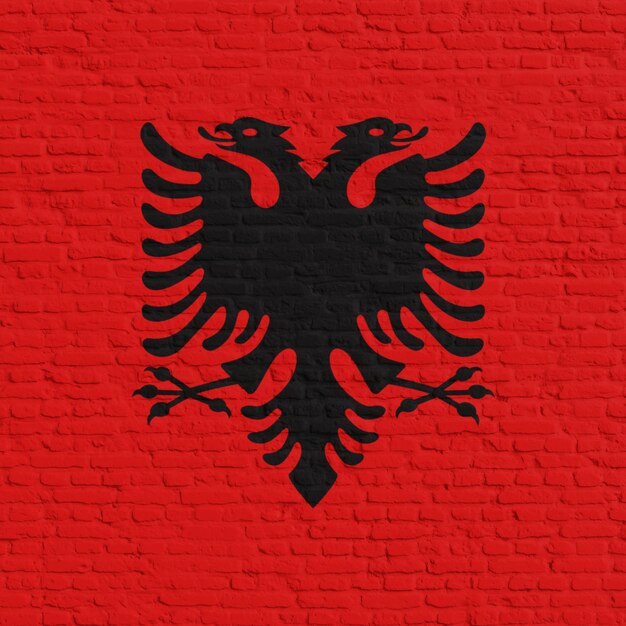 Muro de ladrillo con la bandera de Albania