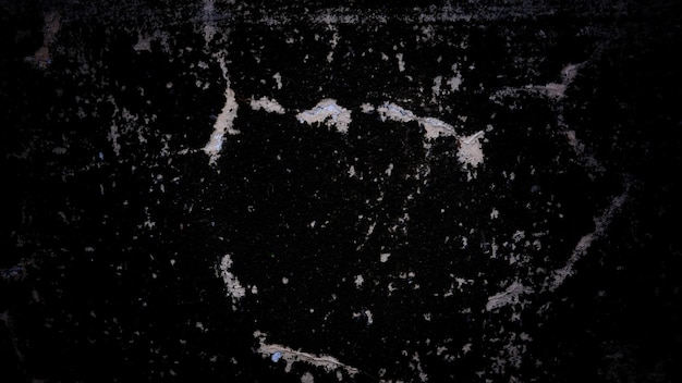 Muro oscuro aterrador lleno de manchas y arañazos, se puede utilizar como fondo