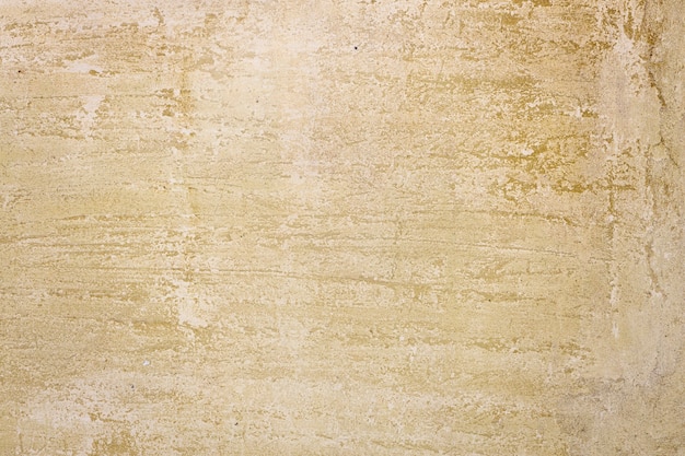 Muro de piedra amarilla. superficie texturizada. Fondo de grunge. Foto de alta calidad