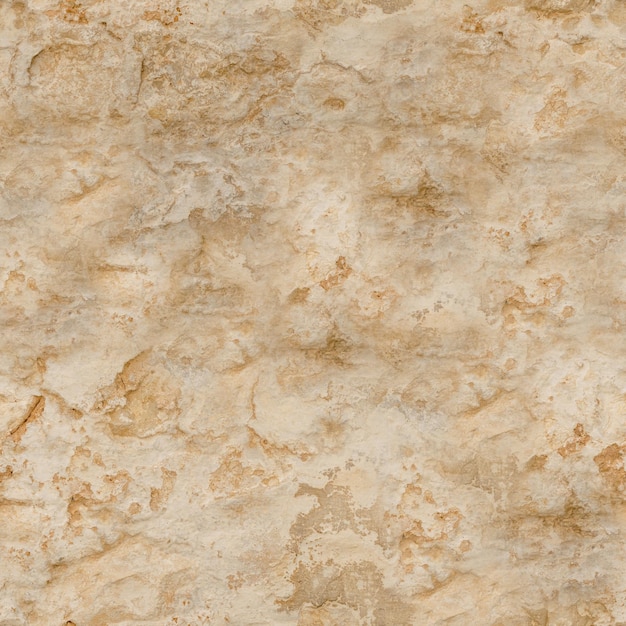 Un muro de piedra beige con una textura áspera.