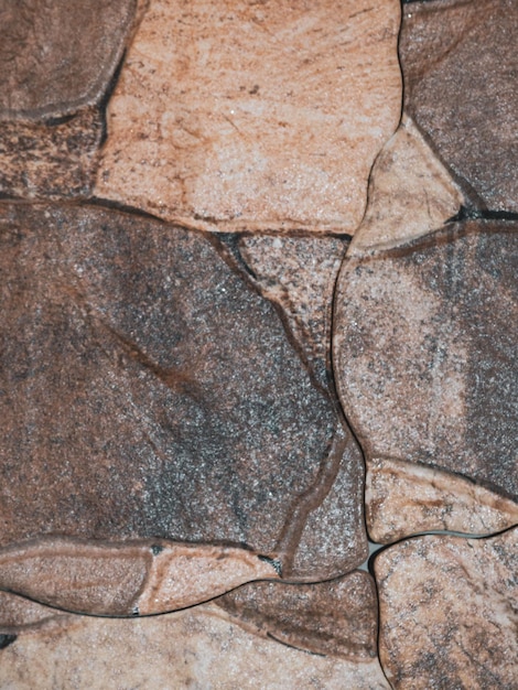 Muro de piedra de fondo de piedra cultivada con textura espacio de copia