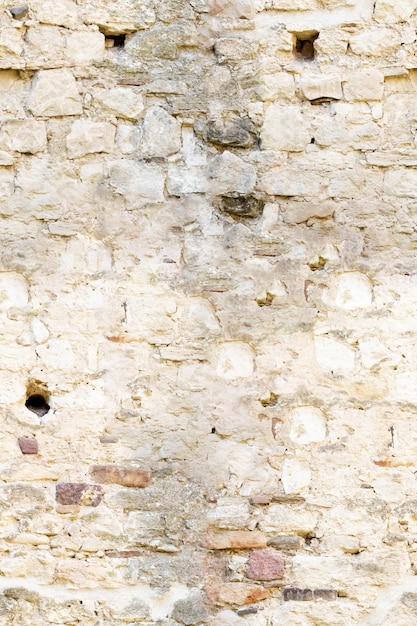 Foto muro de piedra de fondo, textura de color natural de piedra sin fisuras