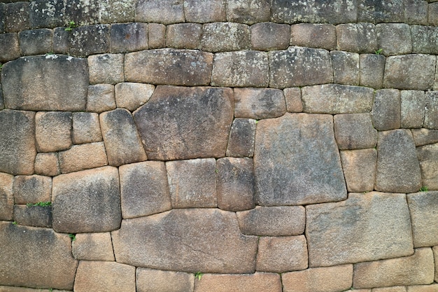 Muro de piedra con piedra inca única dentro de Machu Picchu, Cusco, Urubamba, Perú