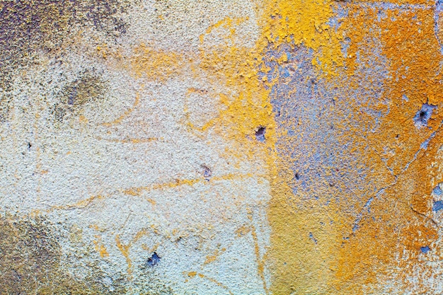 Muro de piedra con pintura vieja agrietada. Foto de alta calidad