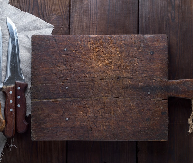 Muy antigua tabla de cortar de madera marrón cocina