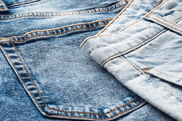 Nahaufnahme der Denim-Taschennähte Elemente der Denim-Kleidung Jeans-Hintergrund zum Nähen Natürliche, strapazierfähige Denim-Stoffe