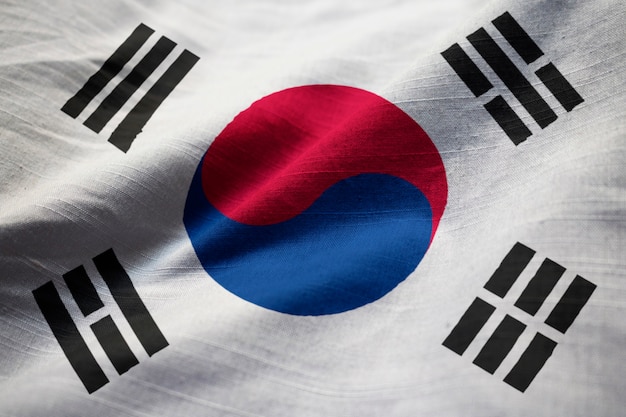 Nahaufnahme der gekräuselten Südkorea-Flagge, Südkorea-Flagge, die im Wind durchbrennt