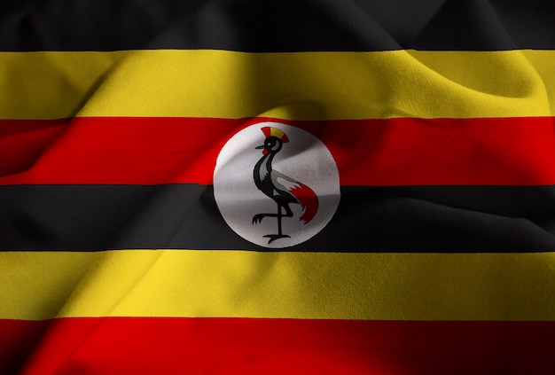 Nahaufnahme der gekräuselten Uganda-Flagge, Uganda-Flagge, die im Wind durchbrennt