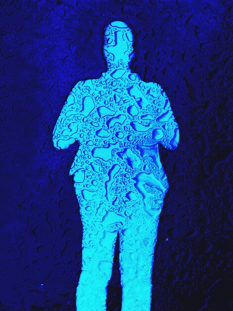 Foto nahaufnahme der statue gegen die blaue wand