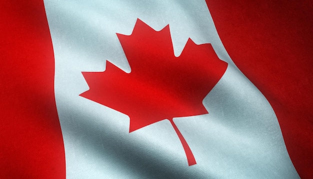 Nahaufnahme der wehenden Flagge Kanadas mit interessanten Texturen