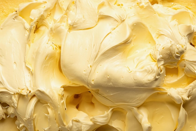 Nahaufnahme des vollständigen Bilddetails des üppigen Vanille-Gelatos mit glatter beigefarbener Textur