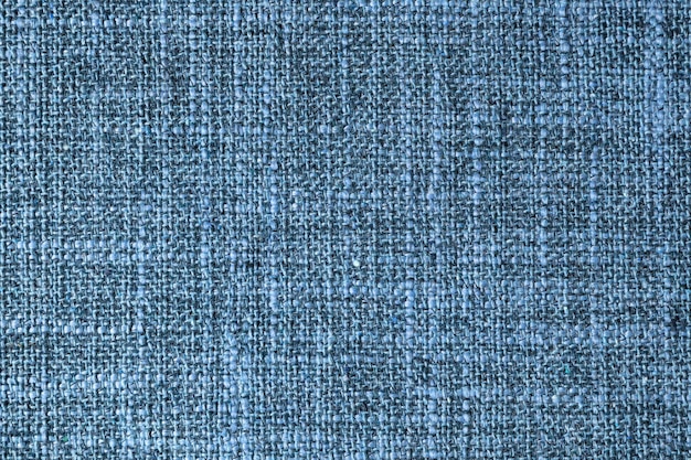 Nahaufnahme Textur aus blauem, grob gewebtem Polsterstoff Dekorativer Textilhintergrund