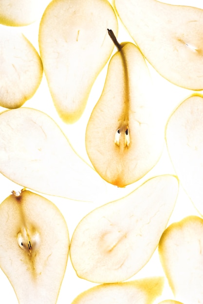 Nahaufnahme Textur von beleuchteten Birnenscheiben Herbst Essen Konzept Hintergrund