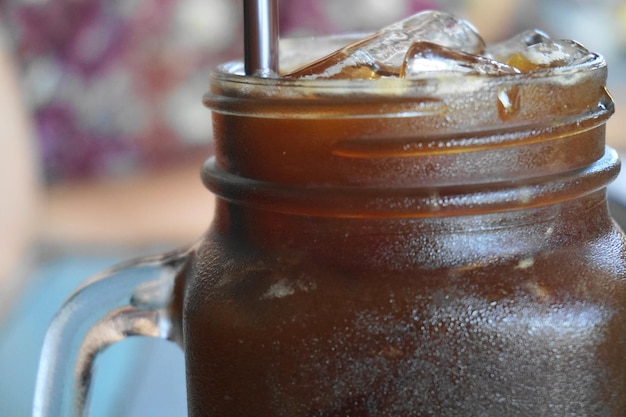 Foto nahaufnahme von eiskaffee in einem glas