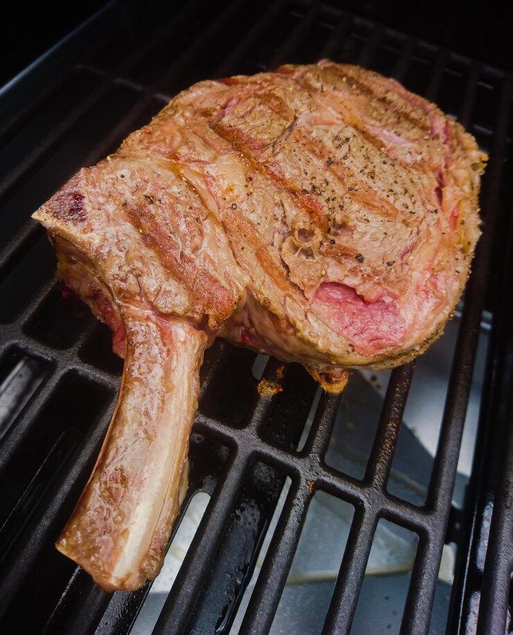 Foto nahaufnahme von fleisch auf dem grill