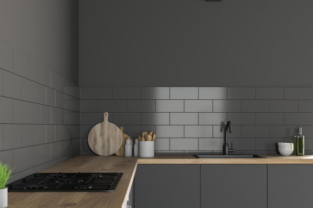 Nahaufnahme von grauen und hölzernen Küchenarbeitsplatten mit eingebautem Backofen und Spüle in der Küche mit grauen Wänden. 3D-Rendering