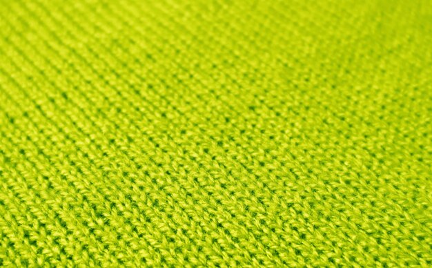 Foto nahaufnahme von lindgrün alpaka strickwolle stoff textur für den hintergrund