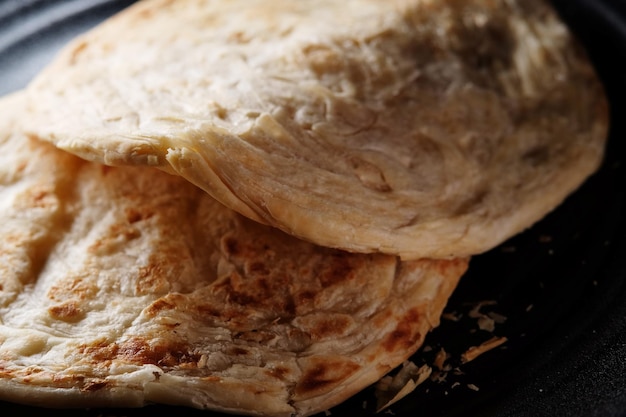 Nahaufnahme von Roti Canai oder Pratha Brot. Eines der berühmten Frühstücke im asiatischen Land