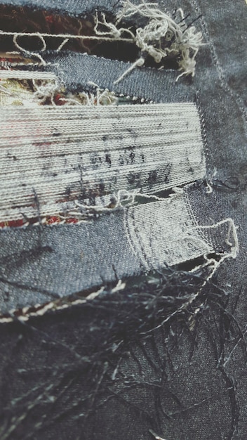 Foto nahaufnahme von zerrissenen jeans