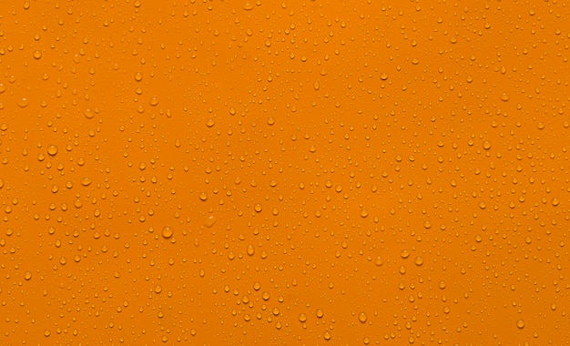 Nahaufnahme Wassertropfen orange Hintergrund