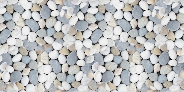 Nahtlose Textur von kleinen Steinen für Garten oder Innenboden in weiß-blau-gelber Farbe. 3D-Rendering.