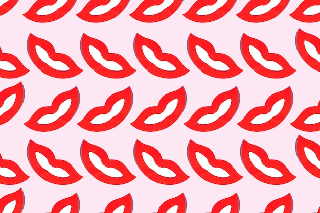 Nahtloses Muster des Lächelns mit roten Lippen für Valentinstag oder Narrentag, die auf rosa Hintergrund lachen