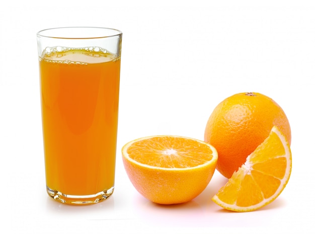 Foto naranja fresca y vaso con jugo