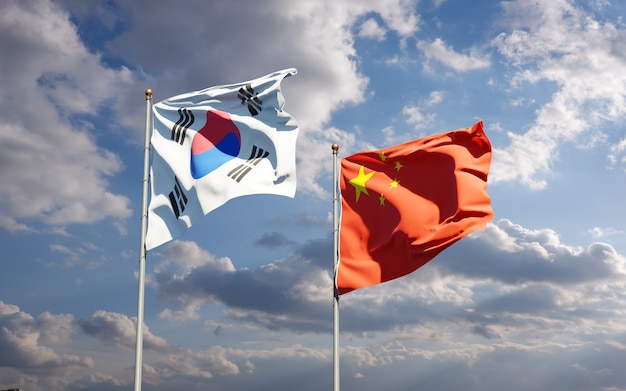 Nationalstaatsflaggen von Südkorea und China zusammen