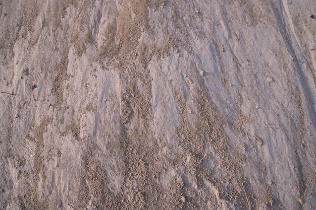 Natürliche Sandmuster-Textur kann als Hintergrundtapete verwendet werden