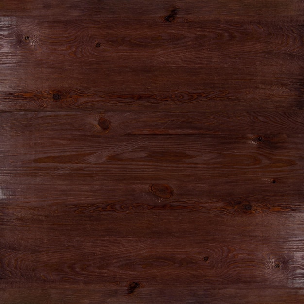 Natürlicher brauner Holzstrukturhintergrund, Mahagoni-Tischplatte