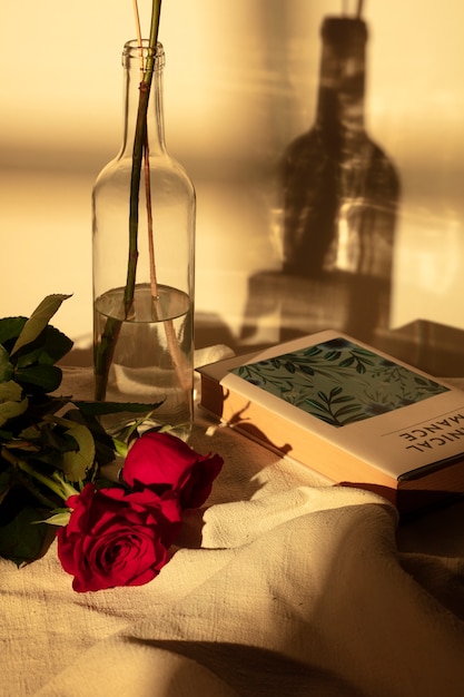 Foto naturaleza muerta de sant jordi para el día de los libros y las rosas