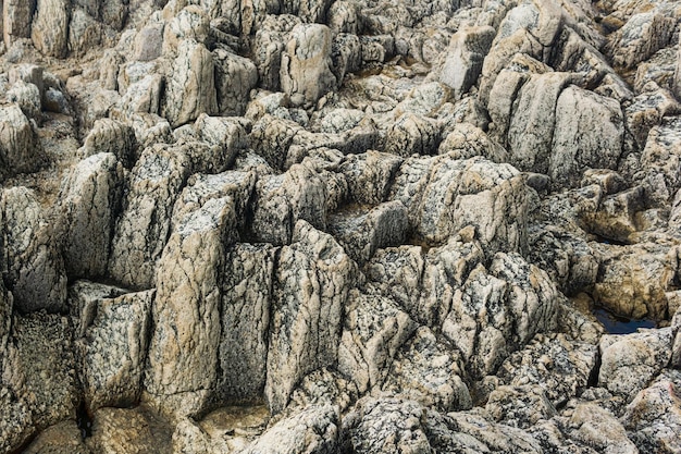 Natursteinhintergrund Die Überreste von Lavabasaltsäulen bilden eine Art Stufen