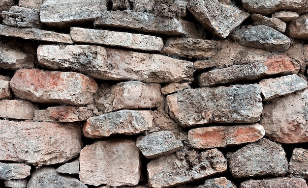 Natursteinmauer als Hintergrund