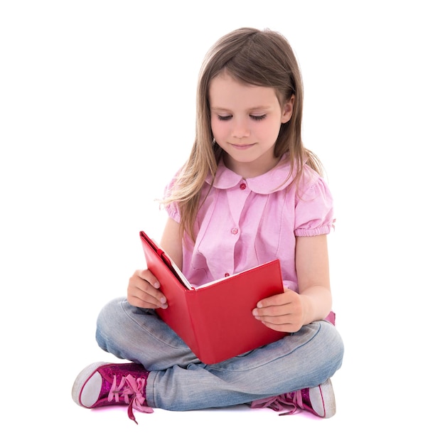 Nettes kleines Mädchen des Bildungskonzeptes mit dem Buch lokalisiert auf weißem Hintergrund