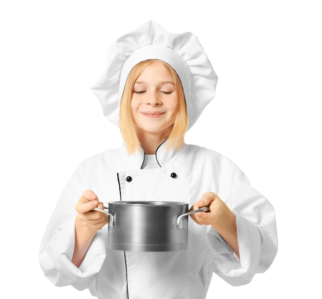 Nettes Mädchen in Kochuniform auf weißem Hintergrund
