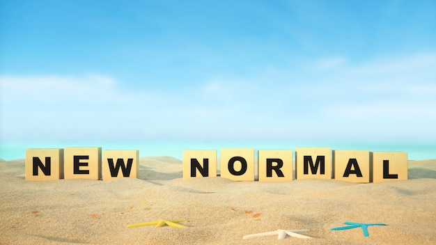 Neues normales Wort am Strand mit blauem Himmel