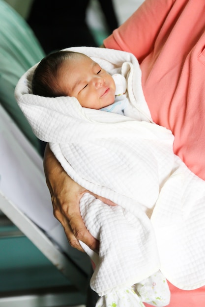 Newborn Asian baby girl sleeping