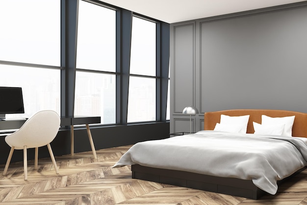 Ángulo de dormitorio principal elegante con paredes grises, una cama blanca con dos mesas de noche y un piso de hormigón. Una oficina en el hogar.