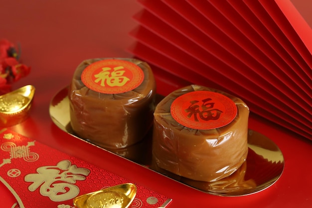 Nian gao ou Kue bakul ou keranjang Bolo de Ano Novo Chinês (com o caractere chinês Fu significa Fortuna).