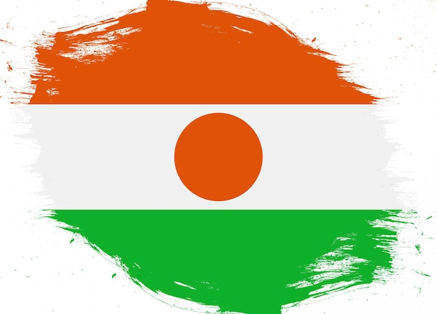 Niger-Flagge auf beunruhigtem Grunge-Bürstenhintergrund