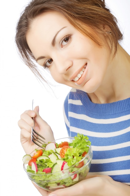 Foto niña comiendo comida saludable