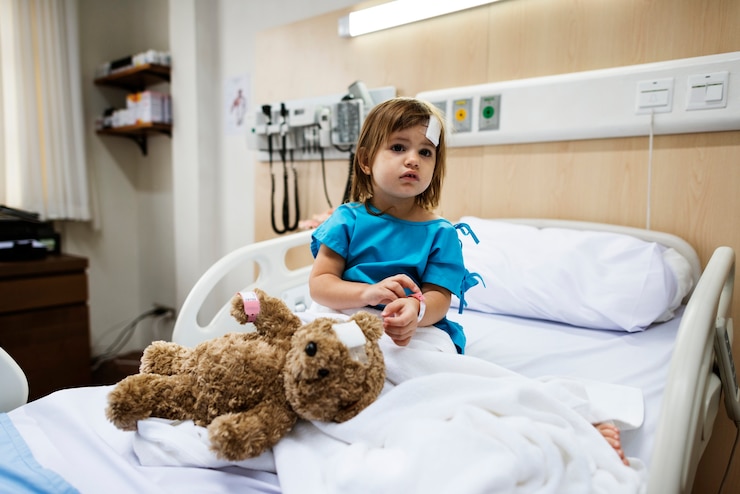 Foto niña enferma en un hospital