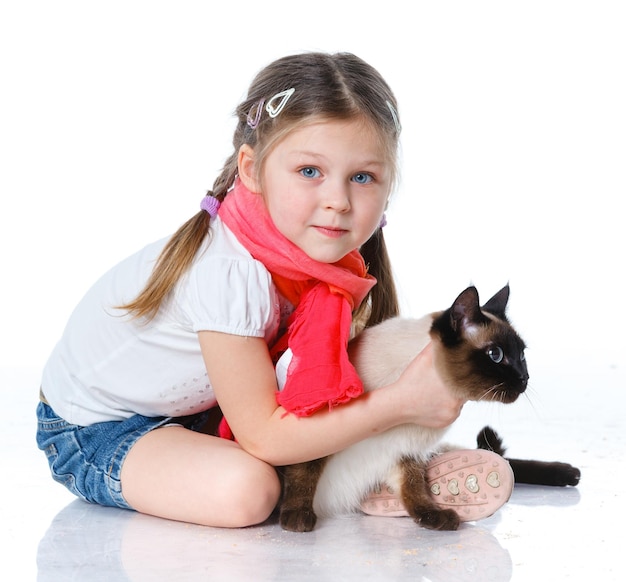 Foto niña y gato