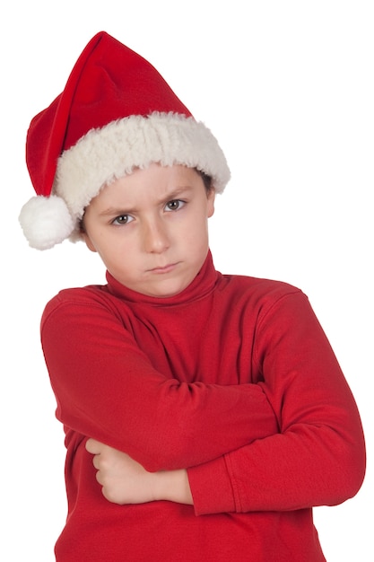 Niño ceñido con sombrero de santa aislado sobre fondo blanco