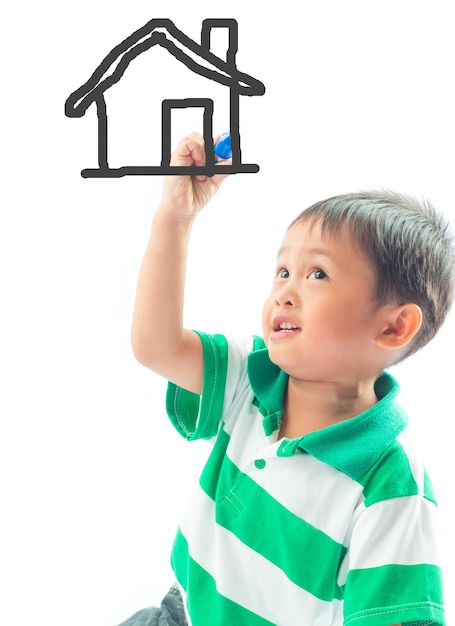 Foto niño dibujando casa abstracta sobre un fondo blanco