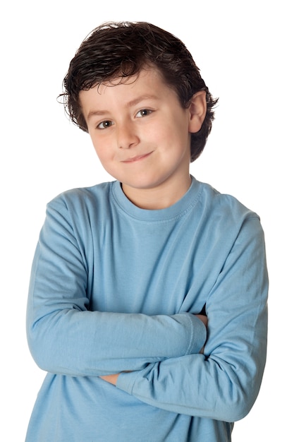 Foto niño divertido con la camisa azul aislada en el fondo blanco