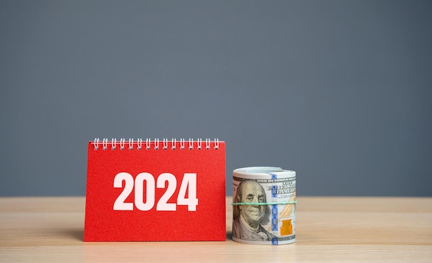 Notas 2024 y billetes de dólar Concepto de planificación presupuestaria Metas y planes financieros Negocios y finanzas Previsión y análisis Estrategia de inversiones