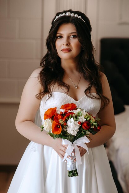 Foto una novia sosteniendo un ramo de flores